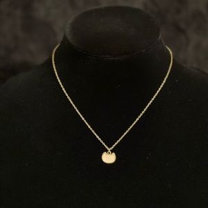 Pink cat filled pendant with gold tone necklace